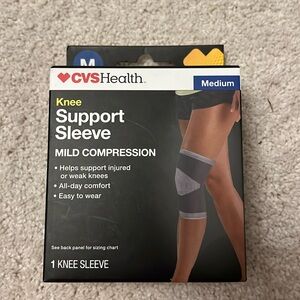 CVS health knee support sleeve, mild compression size medium.